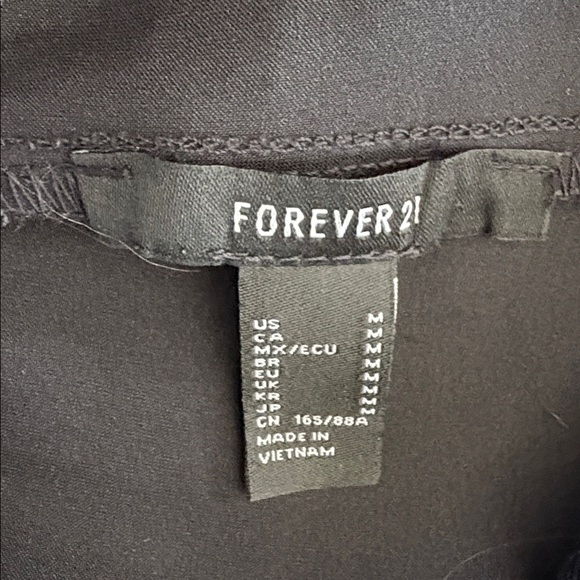 Forever 21 black dress lingerie mini
Open back spaghetti strap V-neck
Size M - Picture 4 of 13